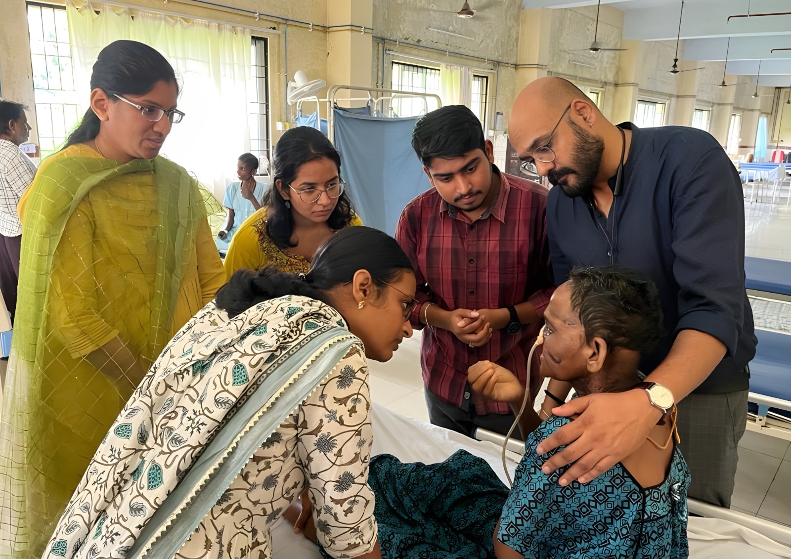 A caregiver providing compassionate support to an elderly woman.